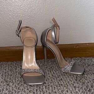 Silver sparkly heels.